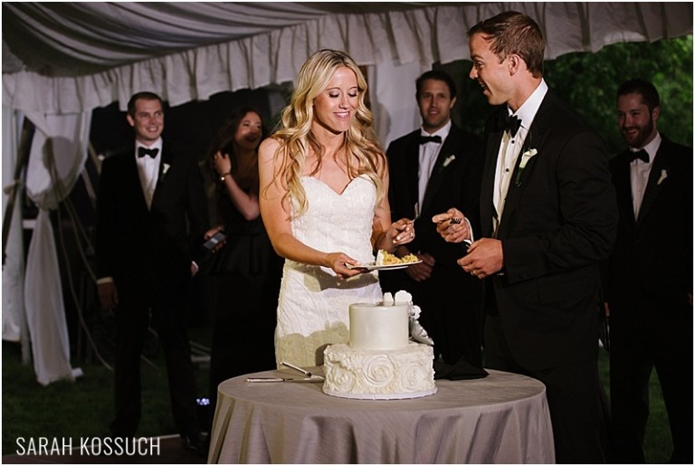 Bride and groom cut cake