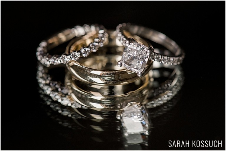 Bride and groom's rings, reflective photography