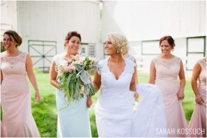 Bride walking with bridesmaids