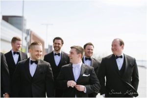 Groom walking with groomsmen, Detroit Renaissance Center, Spring Wedding, Detroit Yacht Club, Belle Isle, Detroit Wedding, Sarah Kossuch Photography