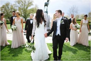 Bride and groom walking with bridal party, sunshine and smiles, Spring Wedding, Detroit Yacht Club, Belle Isle, Detroit Wedding, Sarah Kossuch Photography