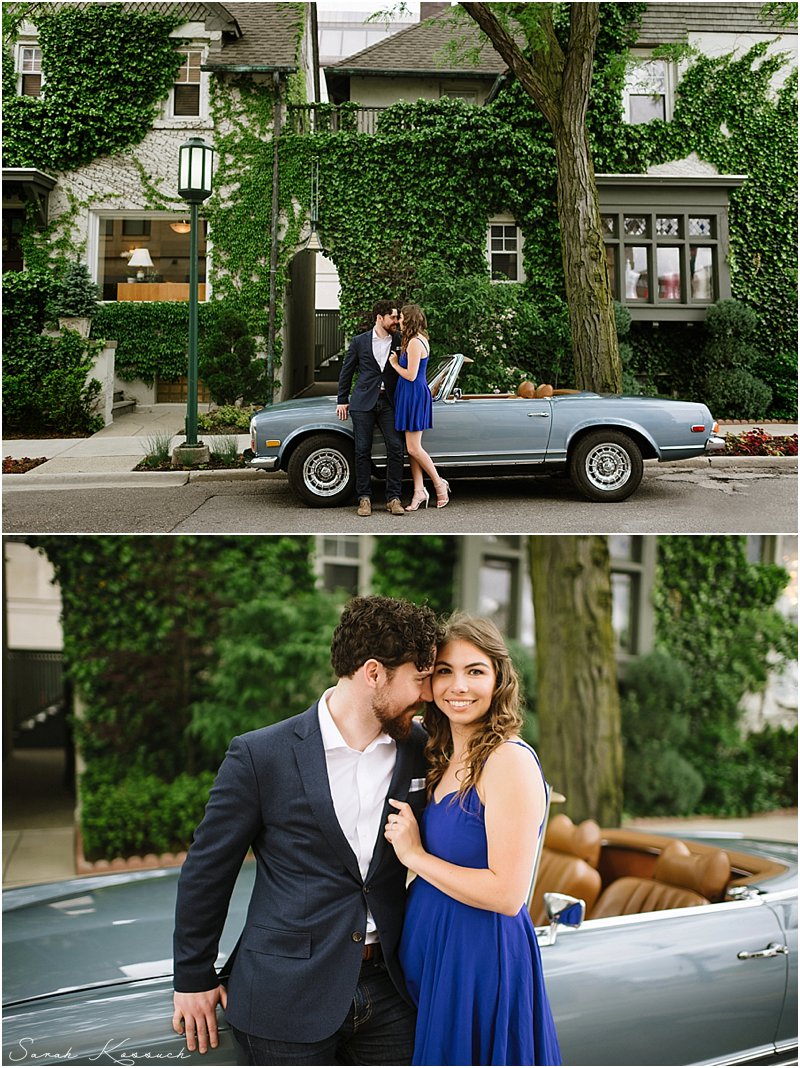 Dusty blue vintage convertible with couple