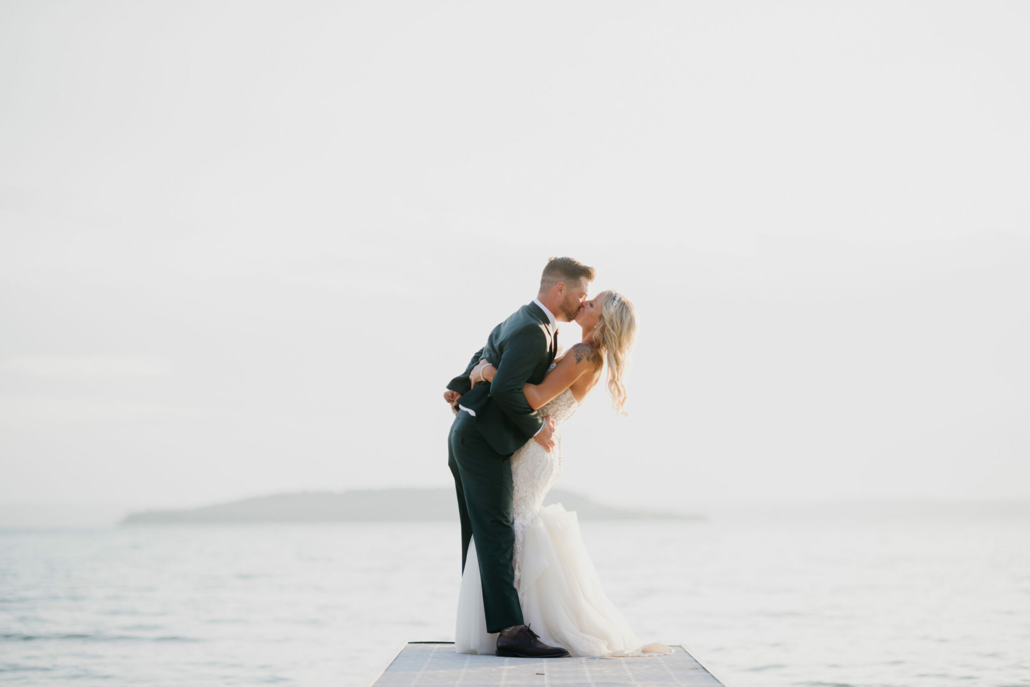 Ashley & Jeremy were married this past weekend at the Jolly Pumpkin in Traverse City and what a way to close the summer out!